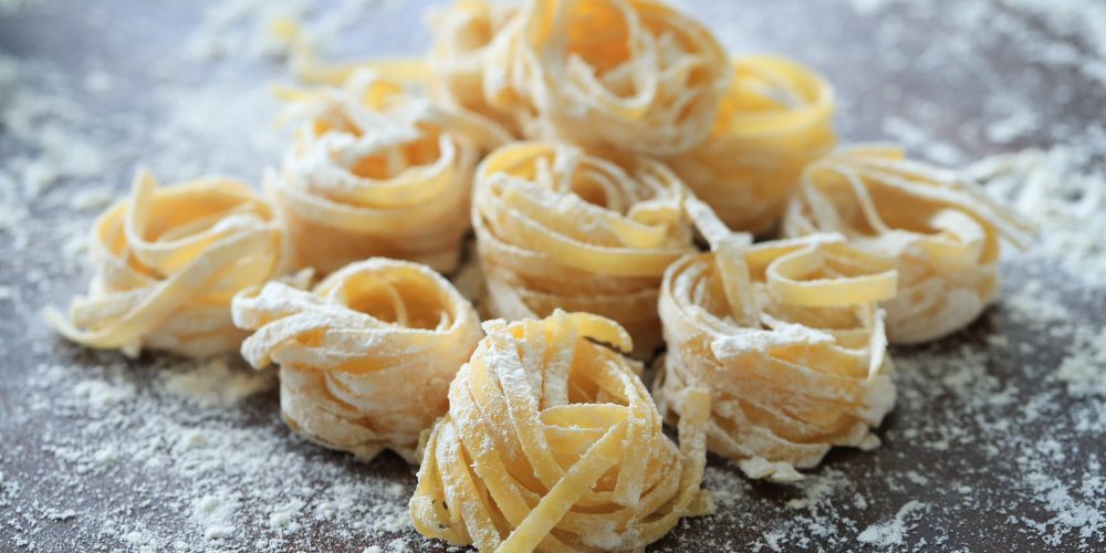 cooking-italian-homemade-pasta-dark-background